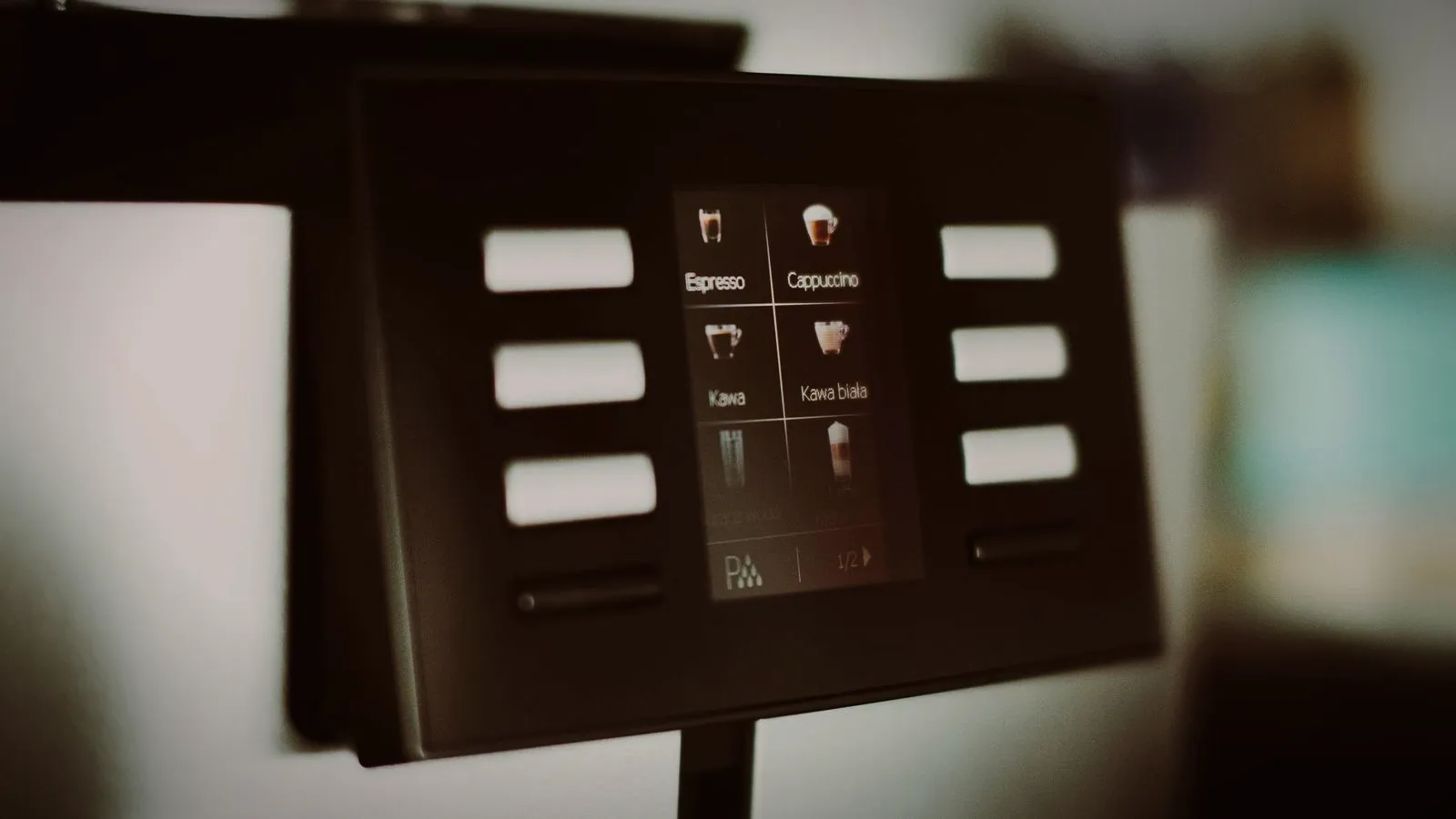Touchscreen drink menu on a super-automatic coffee machine